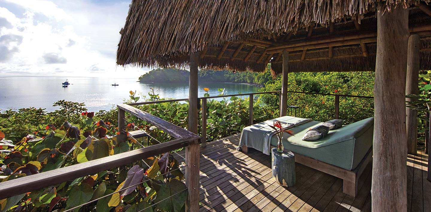 A view out to the ocean from the outdoor day beds of Casita Mirador, a luxury villa at Islas Secas resort | Islas Secas