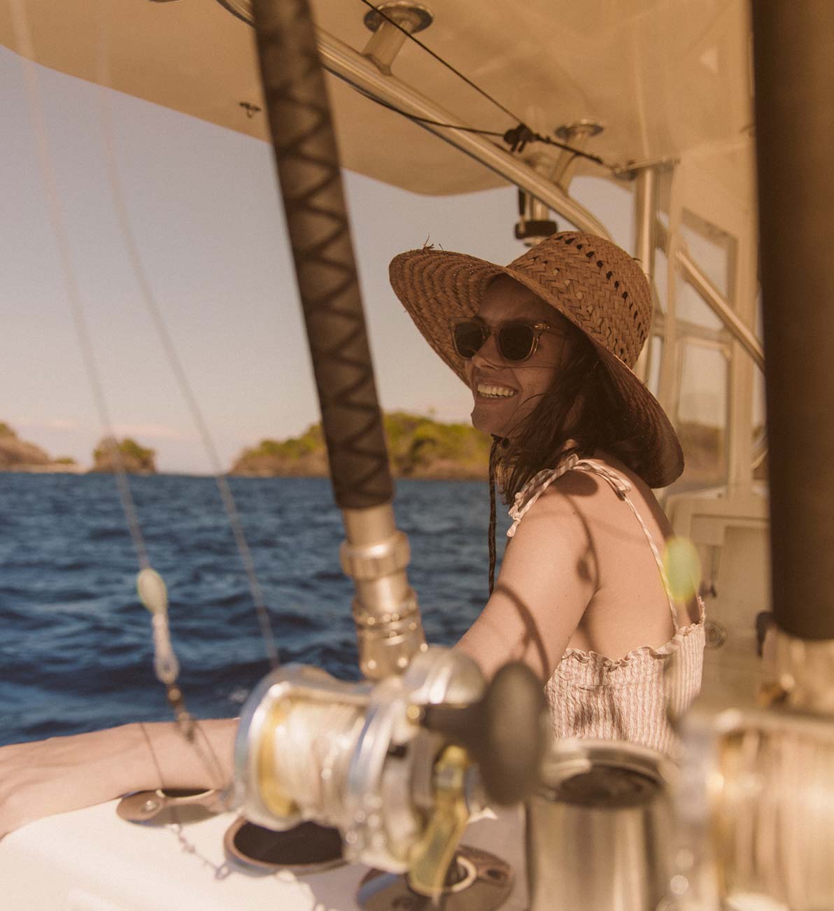 A female guest enjoys one of the boat tours at Islas Secas resort | Islas Secas