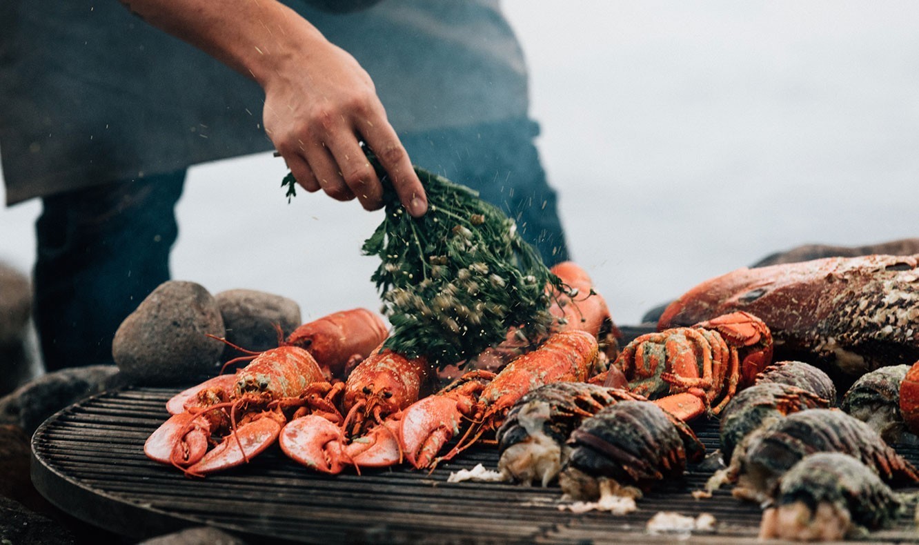 Fresh lobsters are cooked on an open grill at Islas Secas resort, ensuring guests have the freshest quality seafood possible | Islas Secas