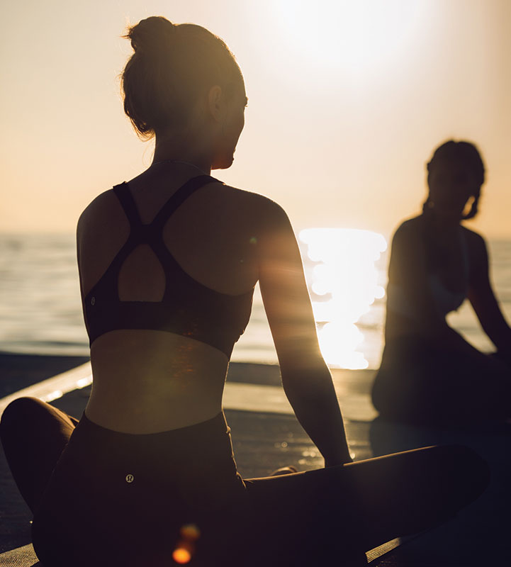 Guests enjoy a private yoga class at sunset at Islas Secas resort | Islas Secas